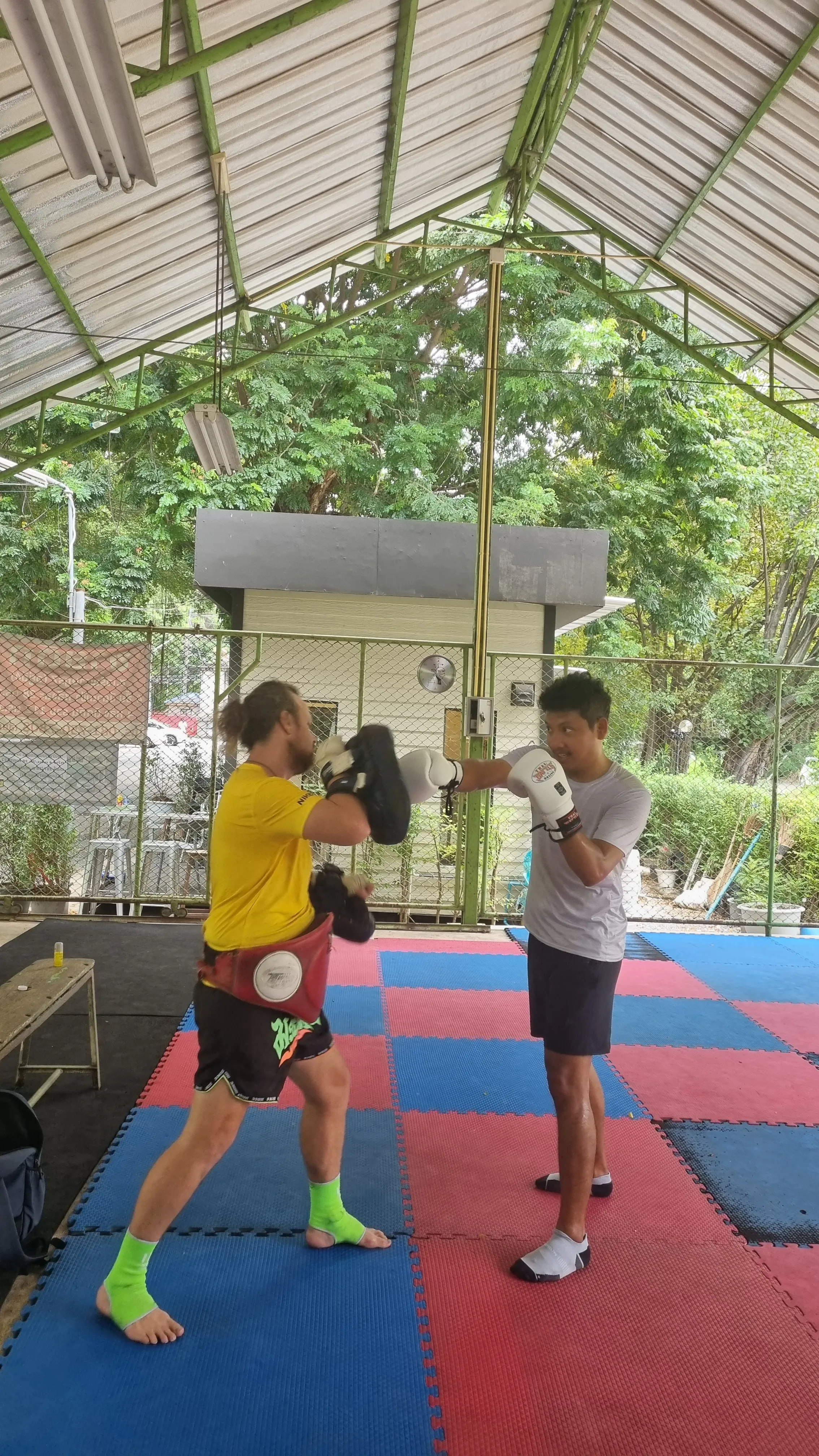 Private Muay Thai coaching session at Naga Gym Pakse